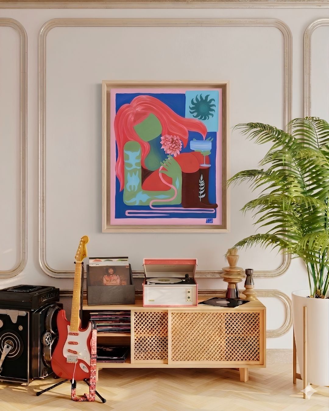 Living room with a wooden console table, colorful artwork, and decorative items.